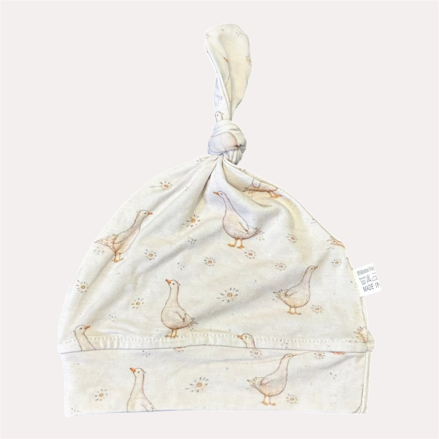 GOOSE & BLOOM TOP KNOT BEANIE